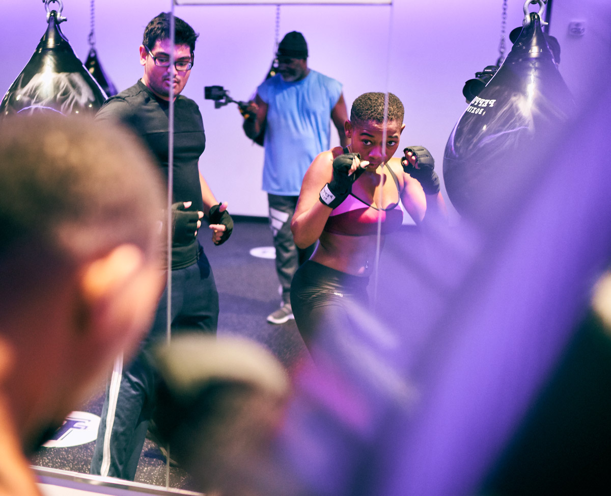 A boxer squares up in a mirror