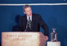 Charles Weltner standing at a John F. Kennedy Library podium