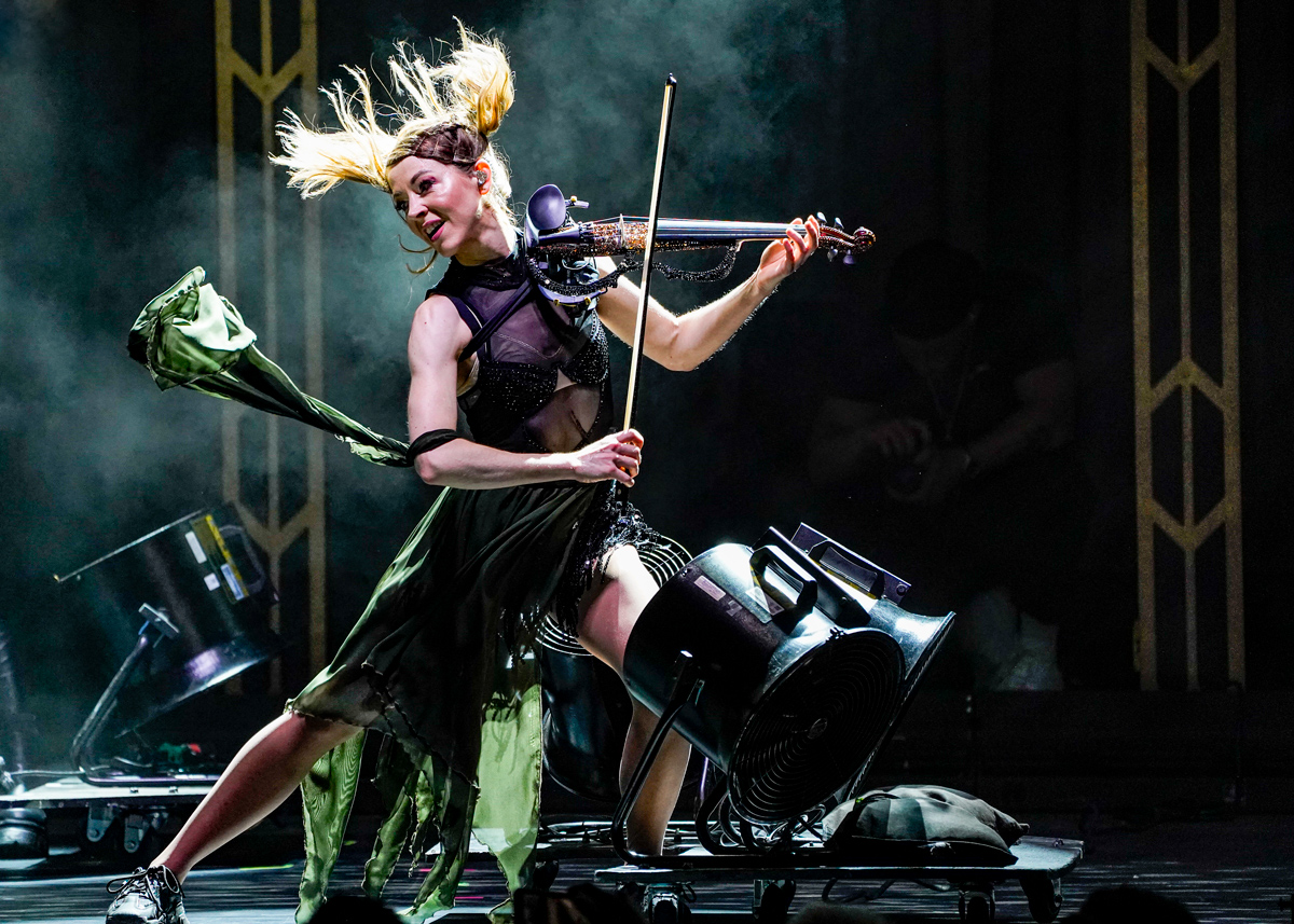 Photo: Lindsay Sterling performing at the Cadence Bank Amphitheater