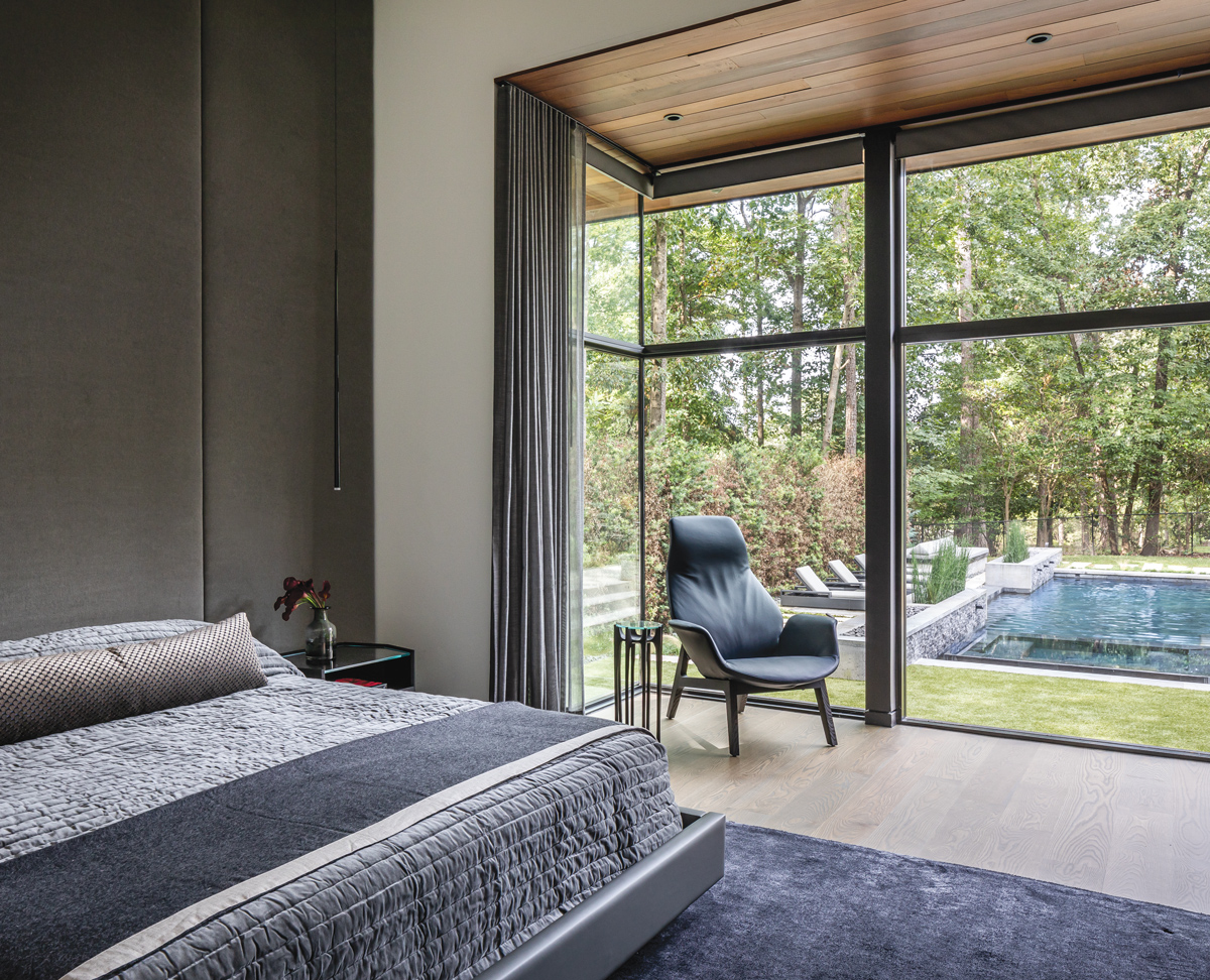 Glass walls and pocket gardens blur the lines between inside and out in this Buckhead home