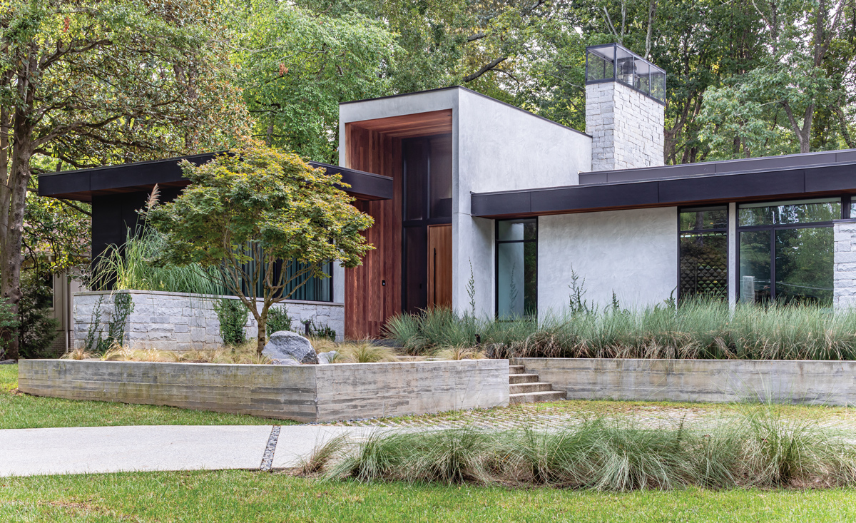 Glass walls and pocket gardens blur the lines between inside and out in this Buckhead home