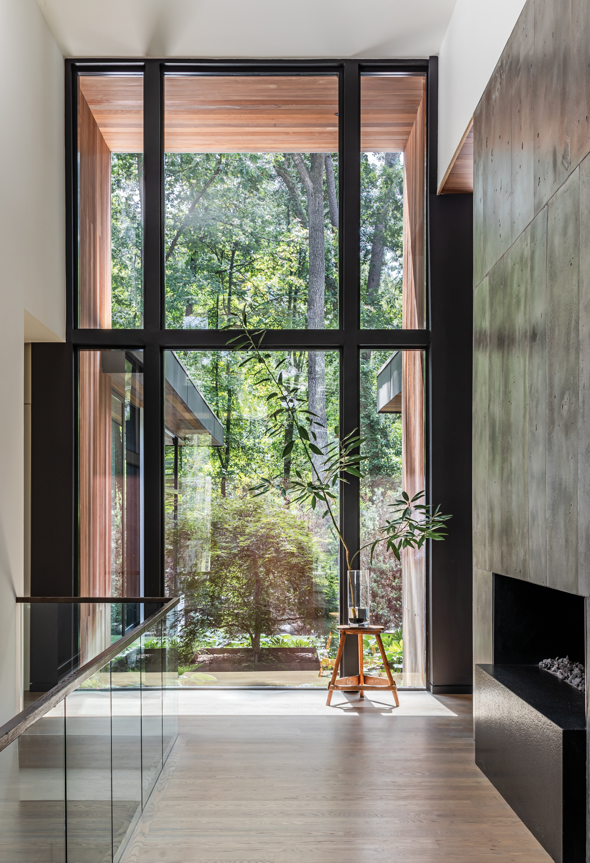 Glass walls and pocket gardens blur the lines between inside and out in this Buckhead home