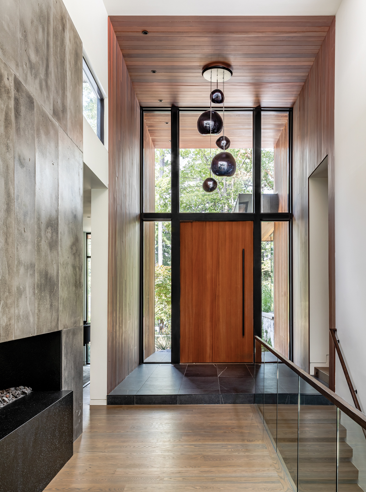 Glass walls and pocket gardens blur the lines between inside and out in this Buckhead home