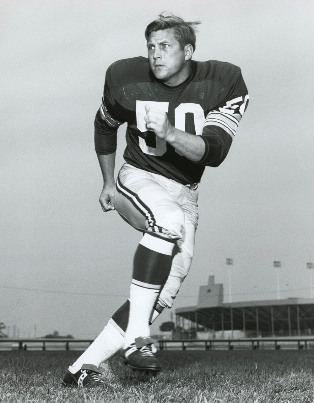 Black and white photo of Bill Curry as a player