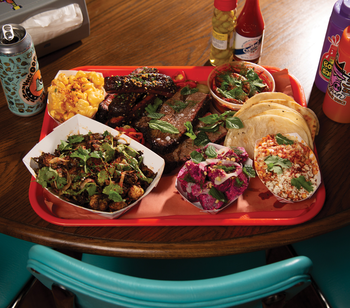 Brisket, mac and cheese, beet salad, creamy esquite and Brussels sprouts.