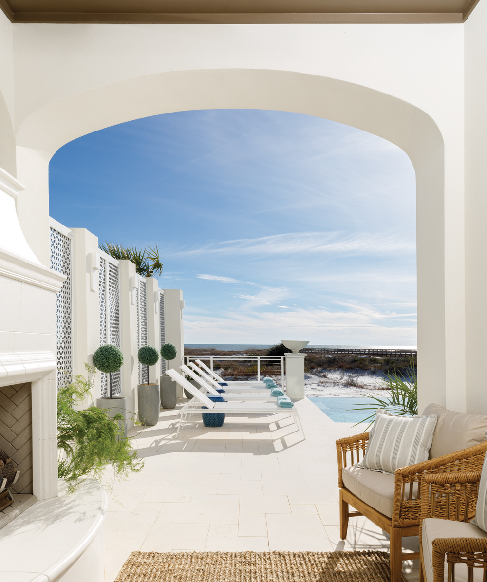 Pool chairs and outdoor fireplace