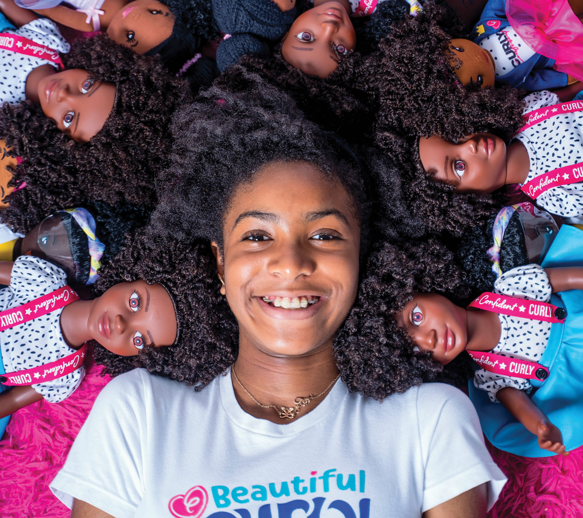 Zoe Oli and dolls from her Beautiful Curly Me collection