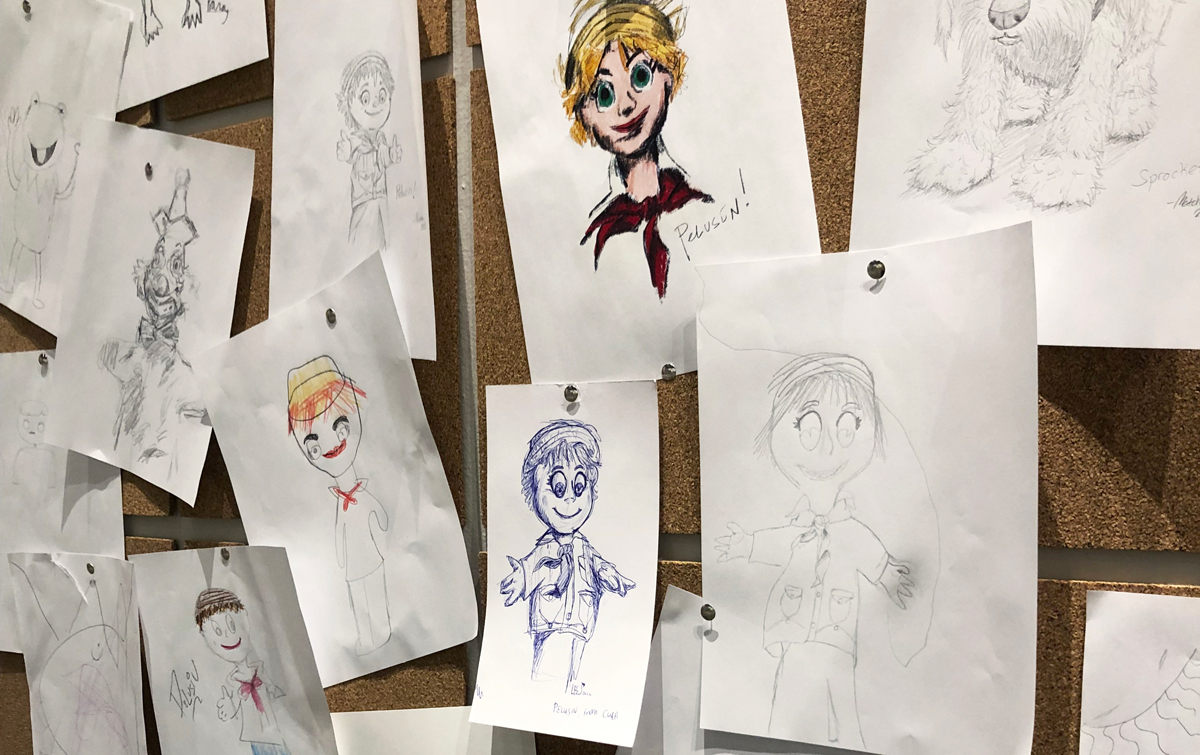 A wall of sketches at Center for Puppetry Arts