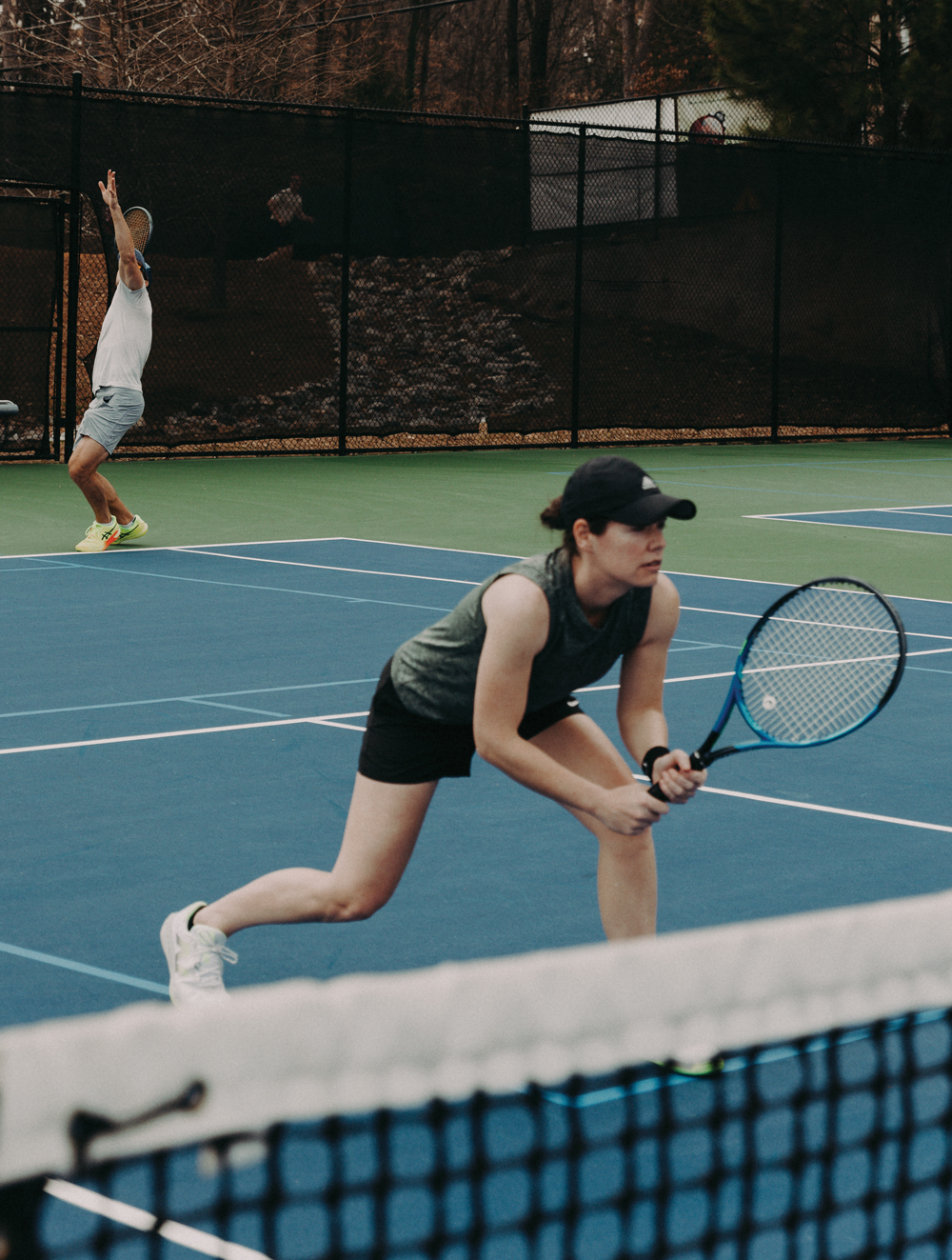 Two people playing tennis at Bitsy Grant Tennis Center