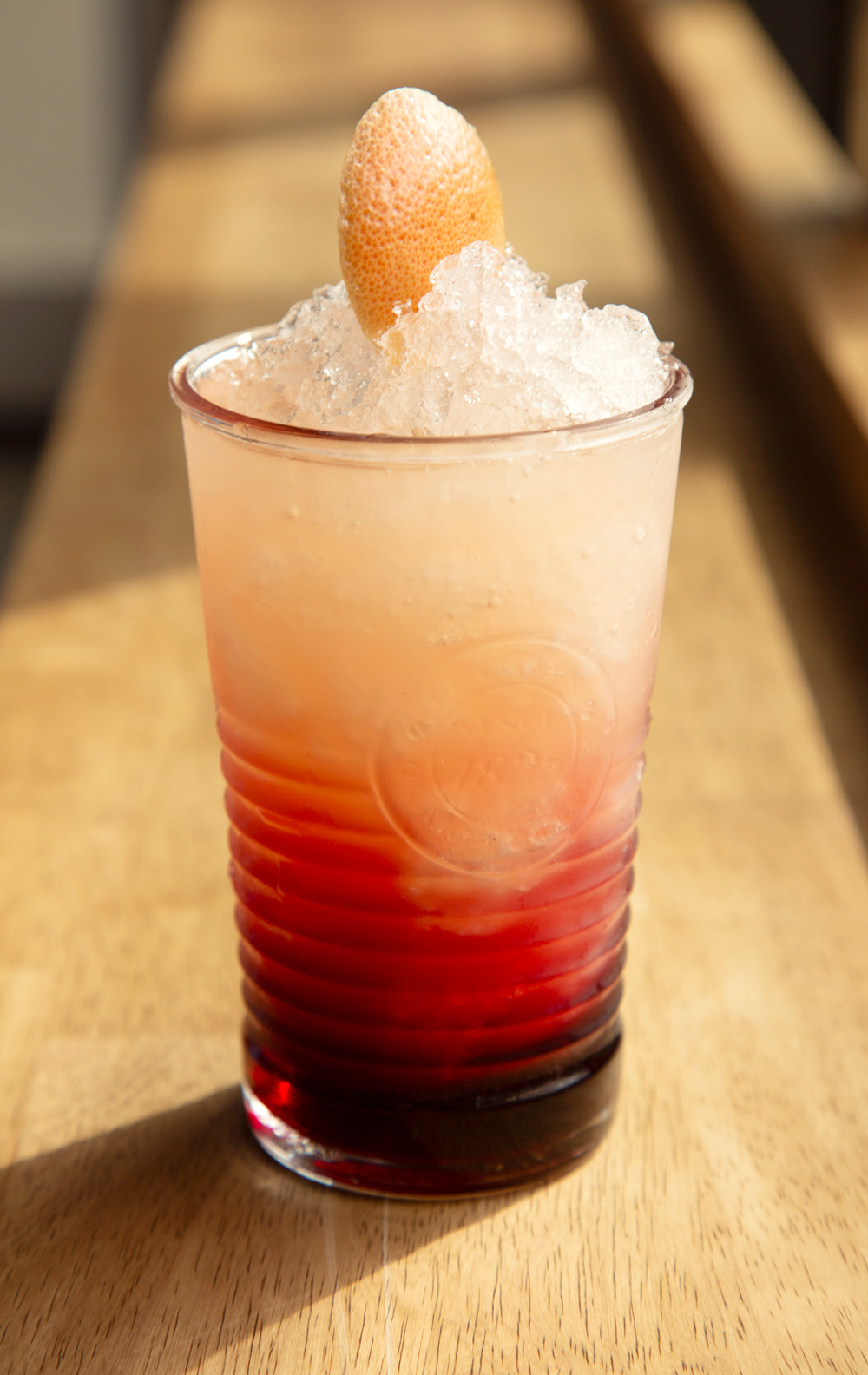 Icy, gradient drink named the "Royale Flush Cocktail"
