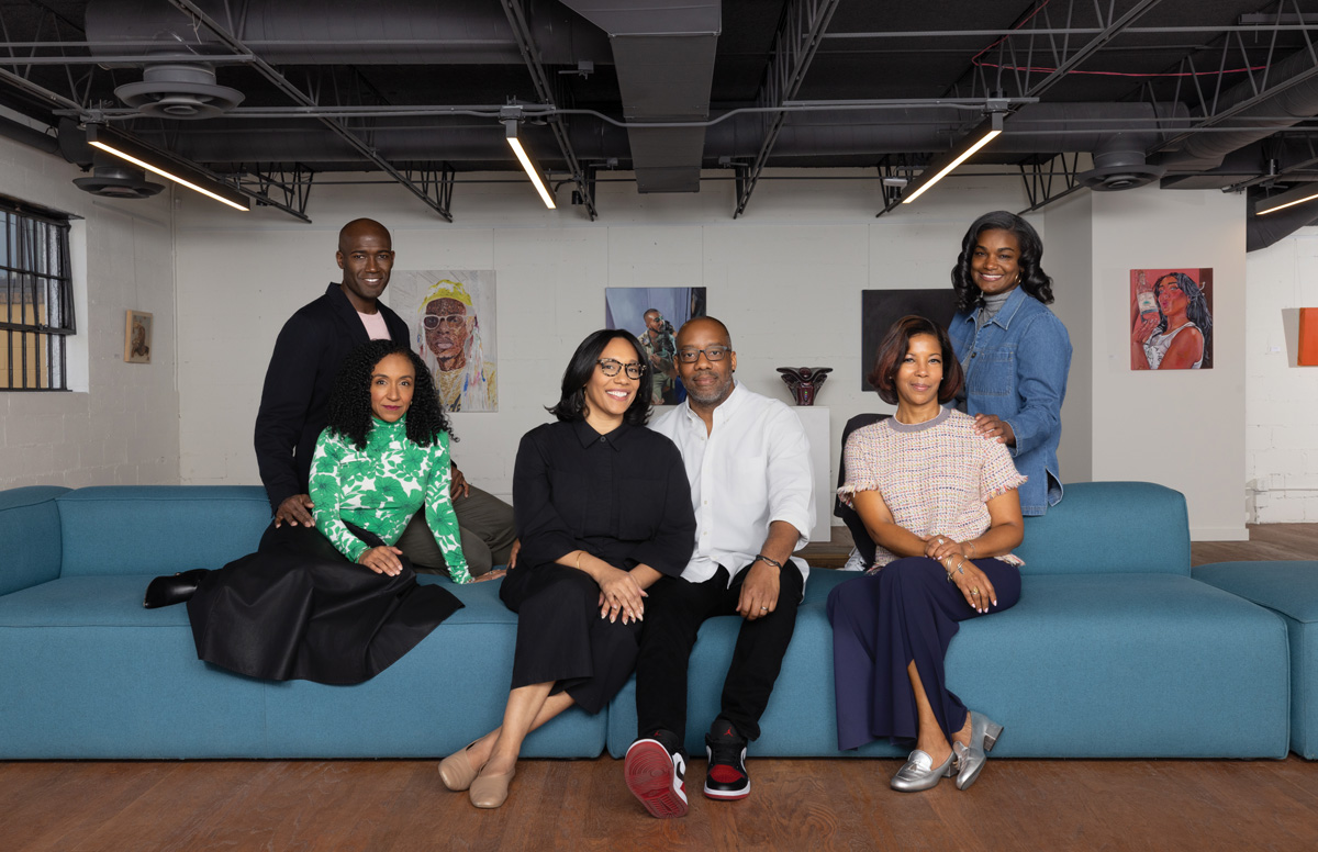 Nasim and Clint Fluker (center) flanked by The Tenth members Justin and Kailee Carr (left), Rokia Lawson (seated lower right), and Miriam Denard