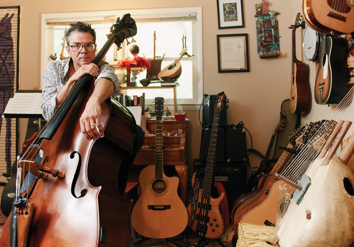 Michael Kurth surrounded by musical instruments