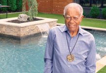 He was one of Martin Luther King Jr.’s most trusted leaders. So why haven’t you ever heard of J.T. Johnson? J.T. Johnson smiles in a yard with manicured greenery and a pool behind him