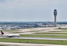 Editor’s Journal: My fear of flying has eased, but I hang on to this musical ritual A Delta plane sits on the Atlanta Airport runway, ready to take off