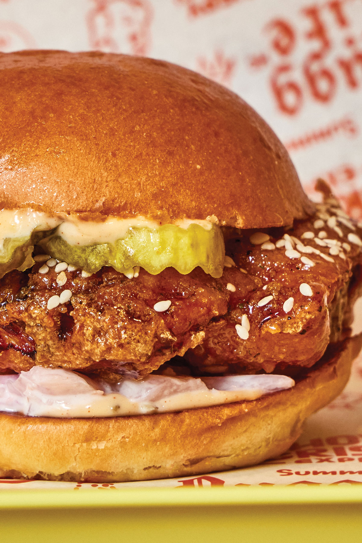 The Honey Boi Chicken Sandwich on a paper-covered tray