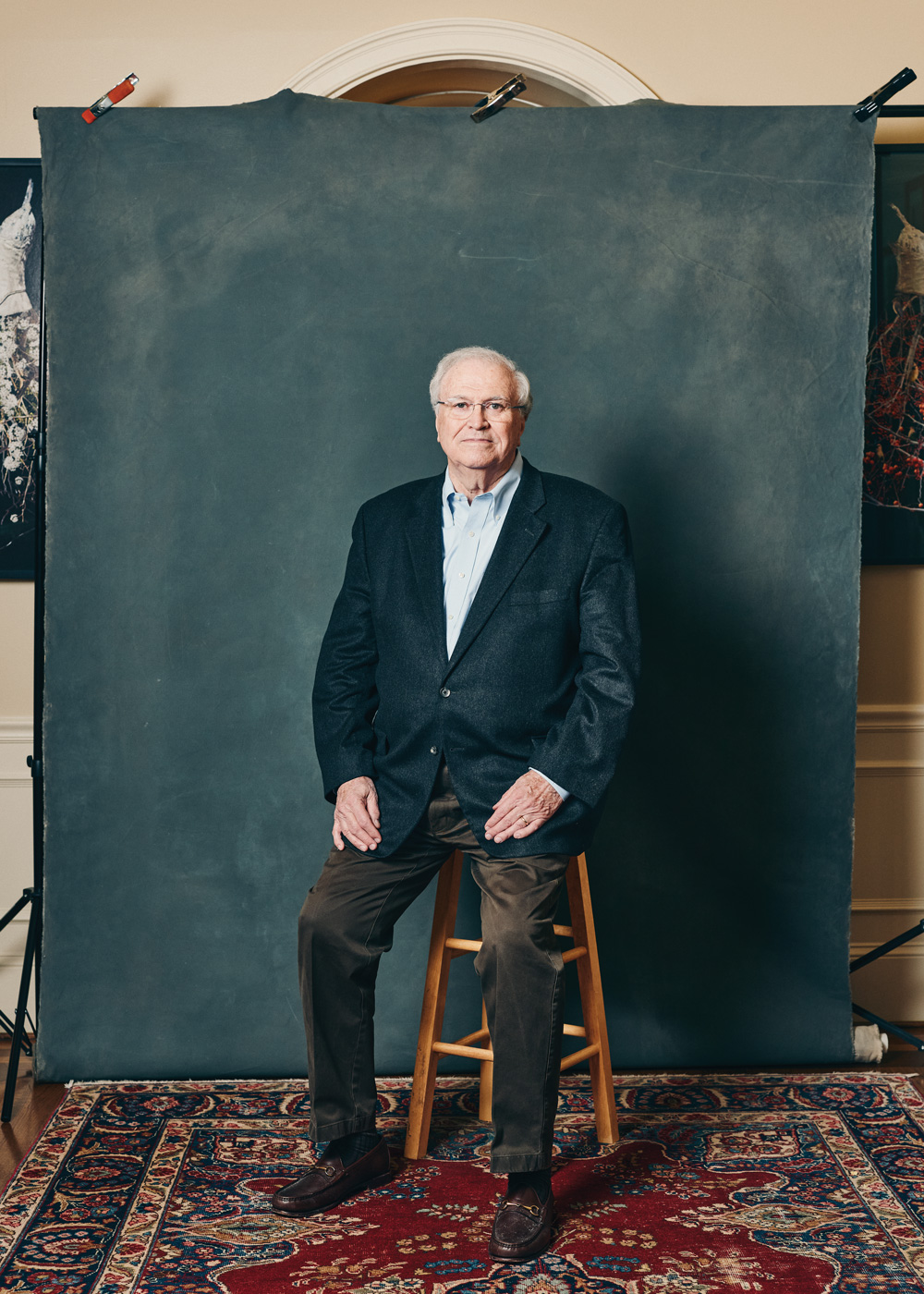 a portrait photo of Johnson against a blue/grey background