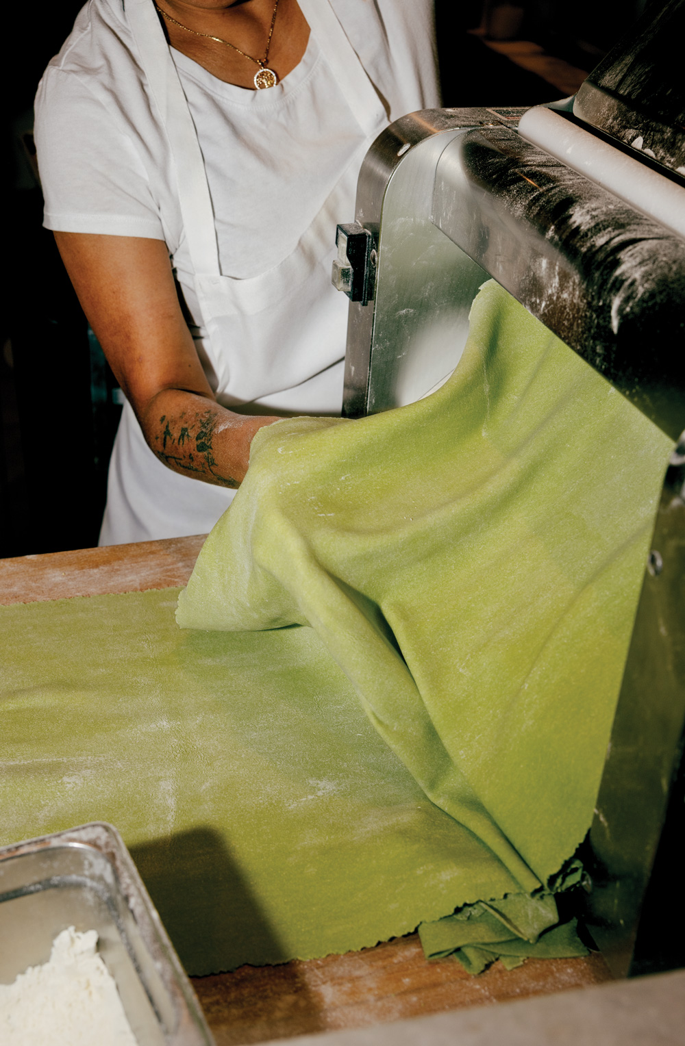 green pasta being made