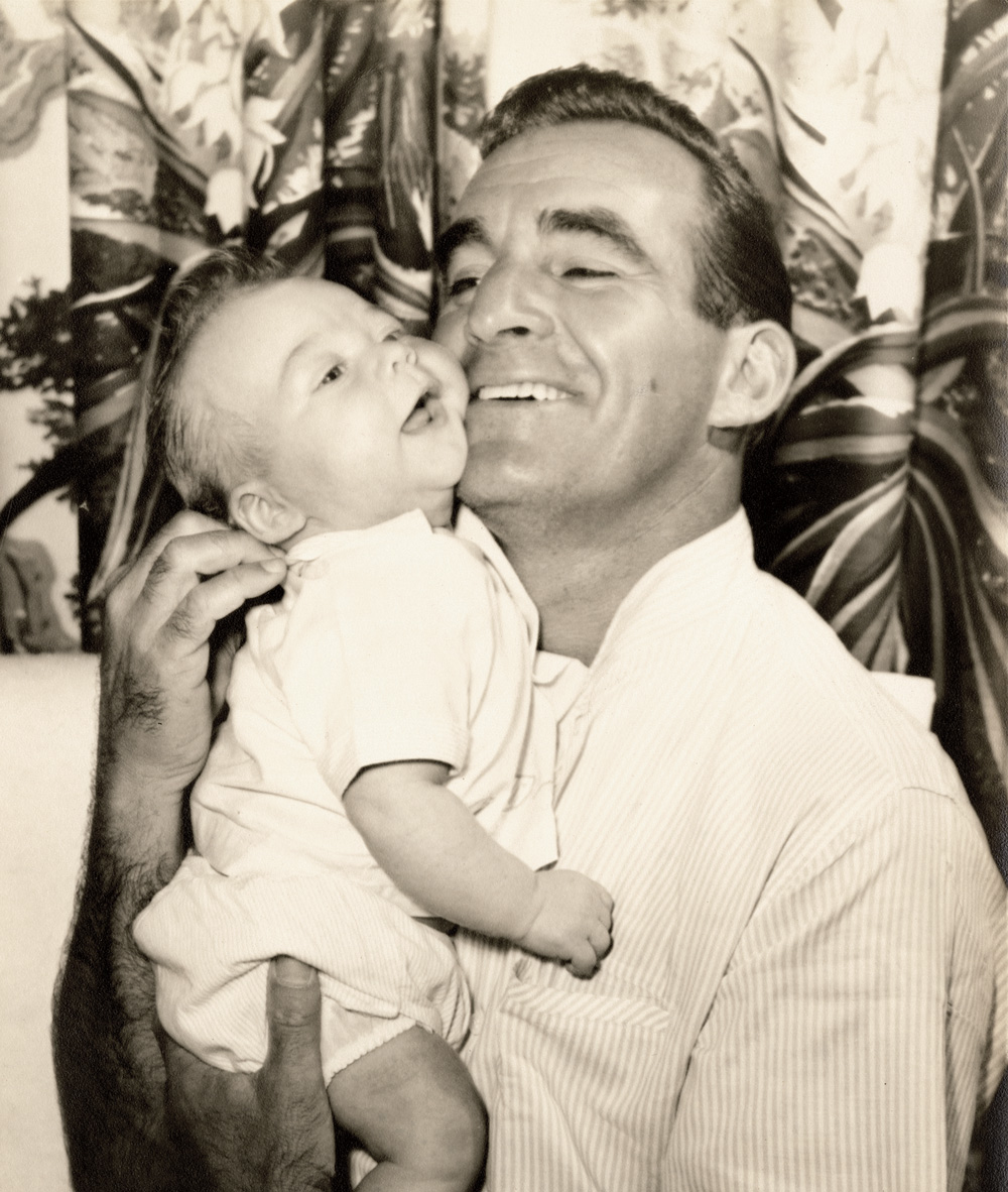 Tom as an infant with his father
