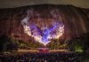 The only fire drone show in Georgia is at Stone Mountain’s Fantastic Fourth Celebration a drone show displays the shape of an eagle in front of a crowd of people at Stone Mountain Park
